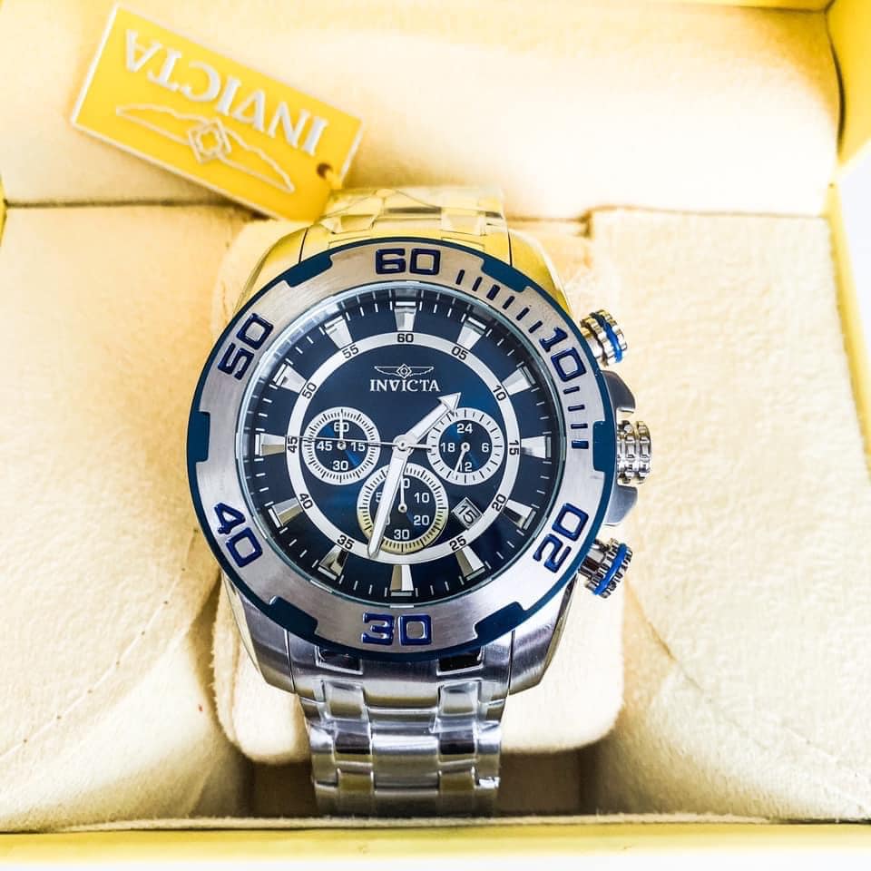 Reloj invicta plateado online con azul