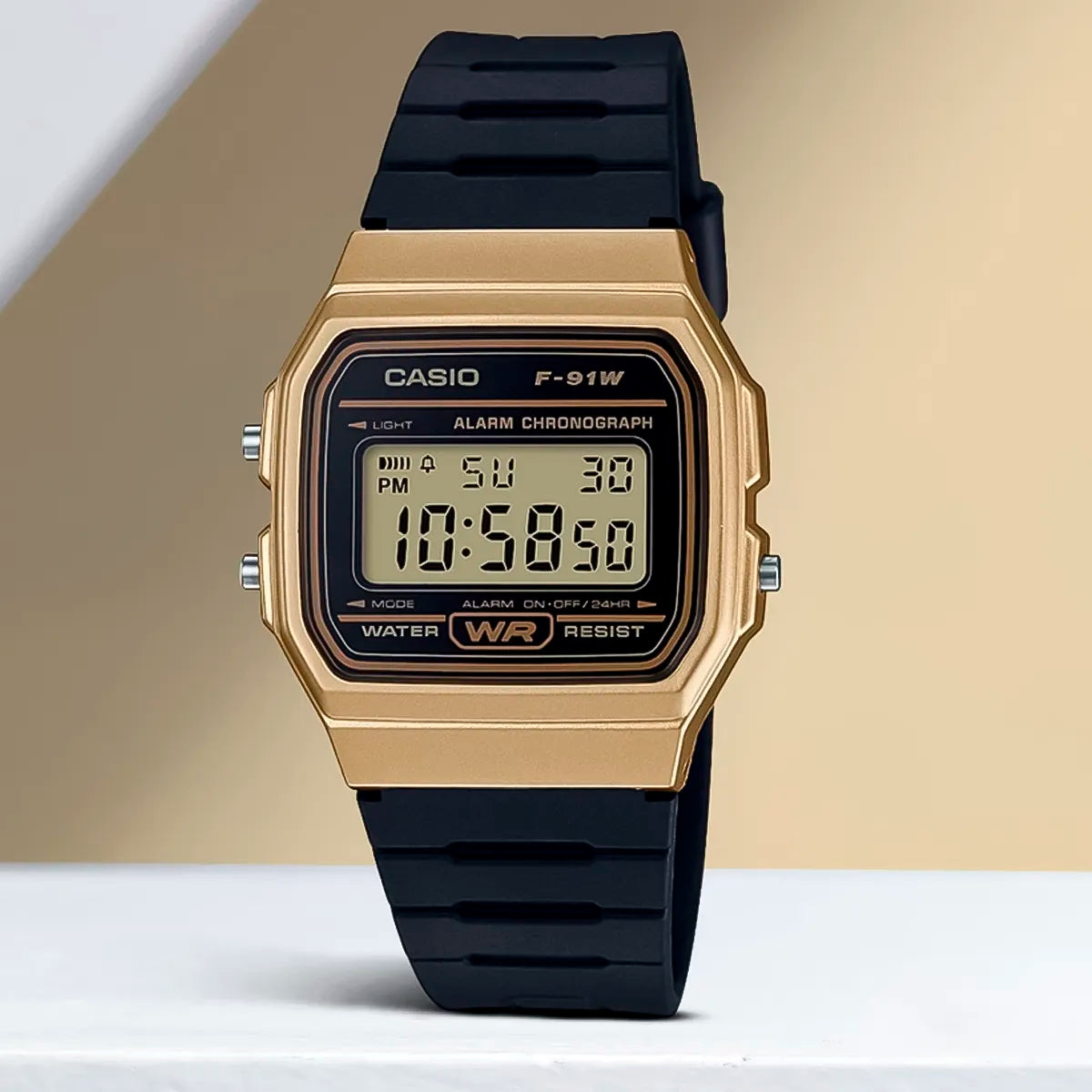 RELOJ CASIO NEGRO CON DORADO F-91WM-9ADF CAS-83