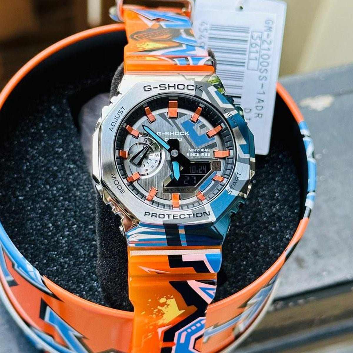 RELOJ G-SHOCK STEEL GRIS CON NARANJA GRAFITI G-S-162