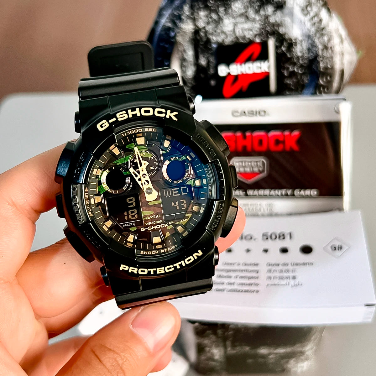 RELOJ G-SHOCK NEGRO CON CAMUFLAJE GA-100CF-1A9 G-SK-107