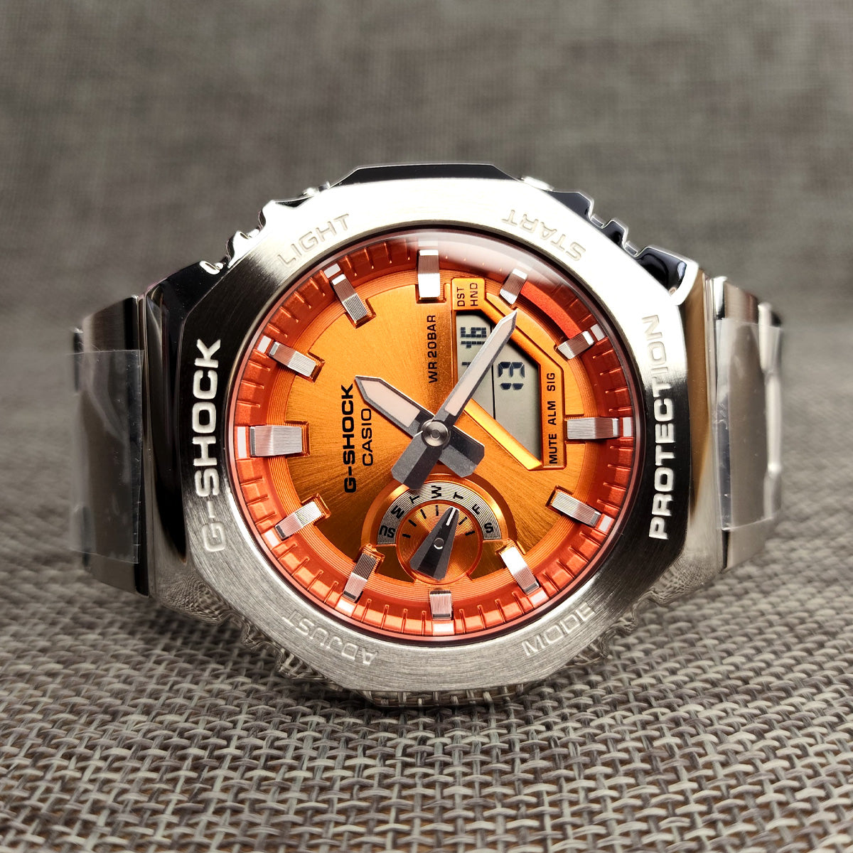 RELOJ G-SHOCK PLATEADO CON NARANJA GM-2110D-4A G-SK-188