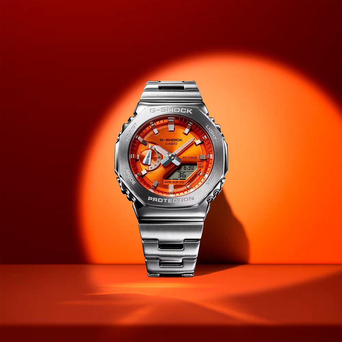 RELOJ G-SHOCK PLATEADO CON NARANJA GM-2110D-4A G-SK-188