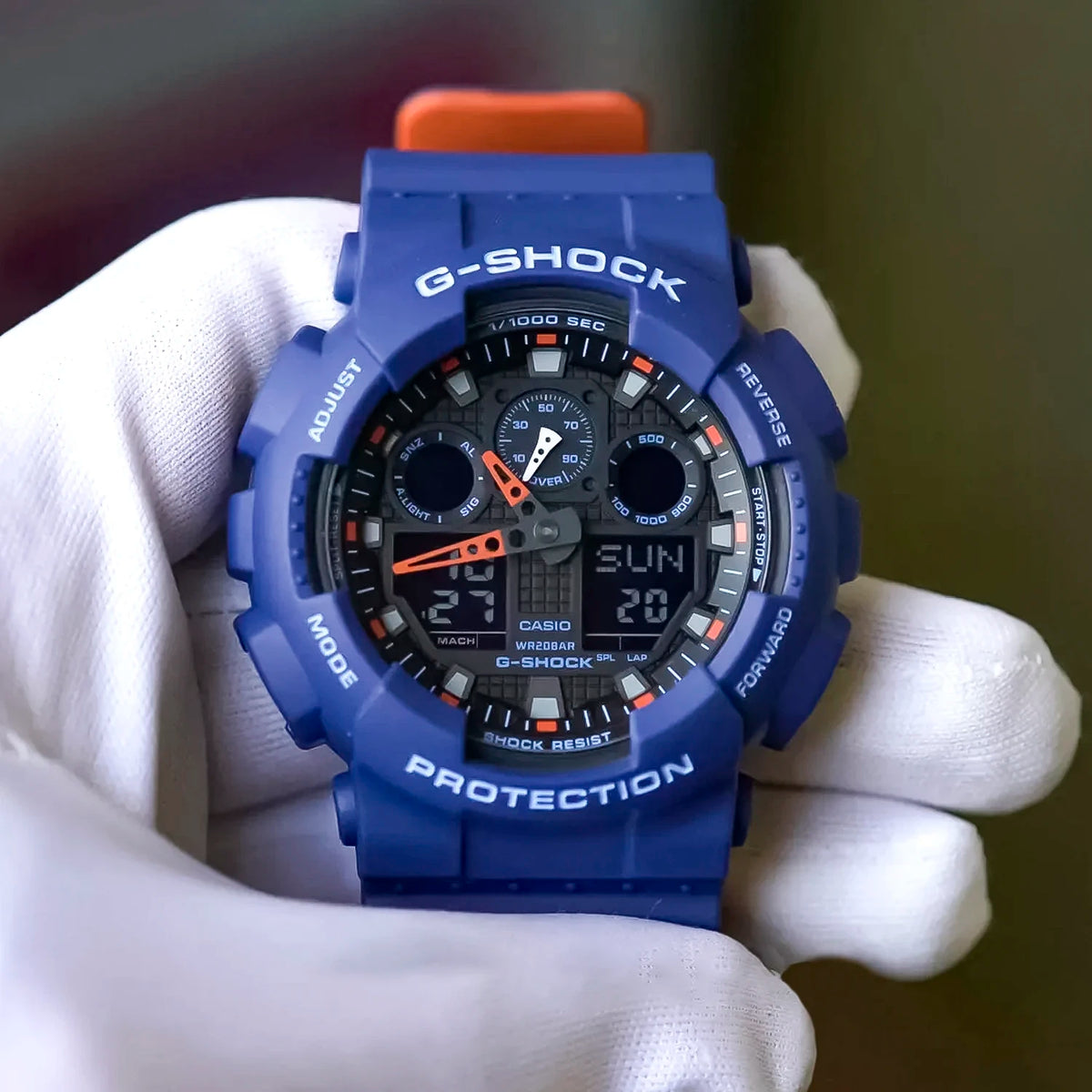 RELOJ G SHOCK AZUL CON NARANJA GA 100L 2ACR G SK 68 Most moda y tecnologia