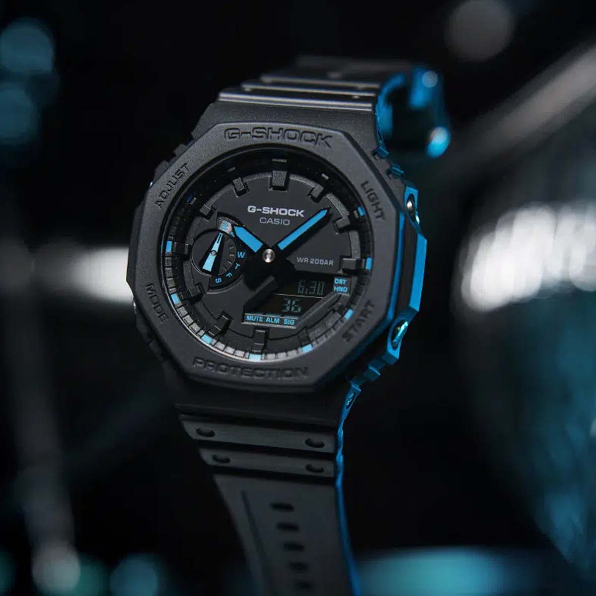 RELOJ G-SHOCK CARBÓN NEGRO CON CELESTE G-S-154