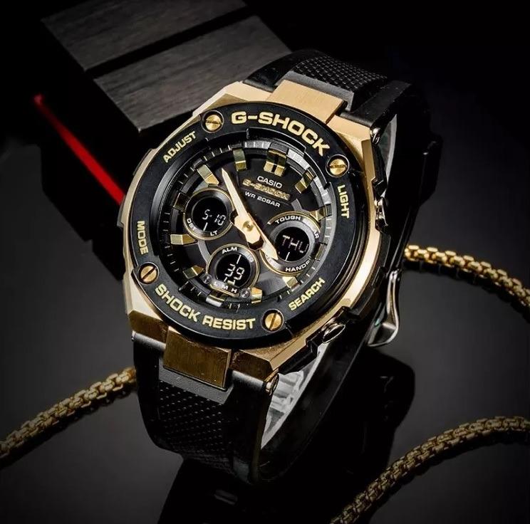 RELOJ G-SHOCK STEEL NEGRO DORADO G-S-82