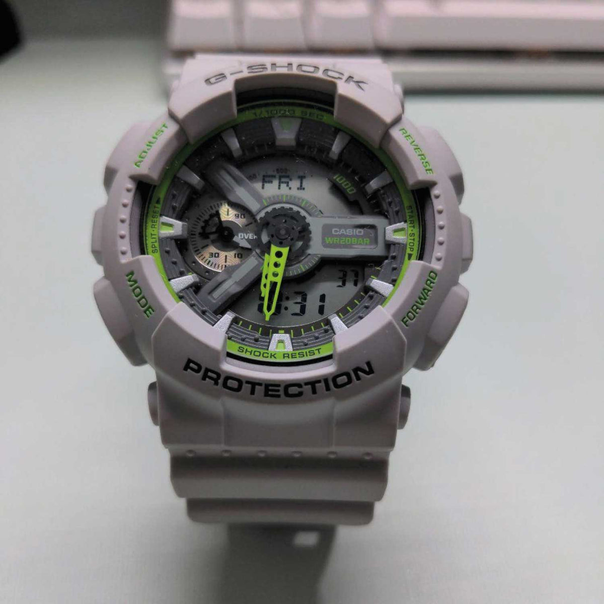 RELOJ G-SHOCK GRIS CON VERDE G-S-219