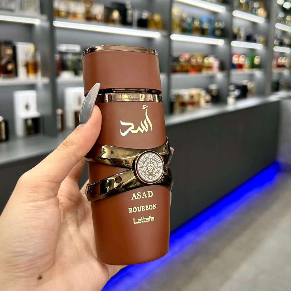 Frasco de perfume Asad Bourbon de Lattafa para hombres, 100ml, fragancia oriental especiada.