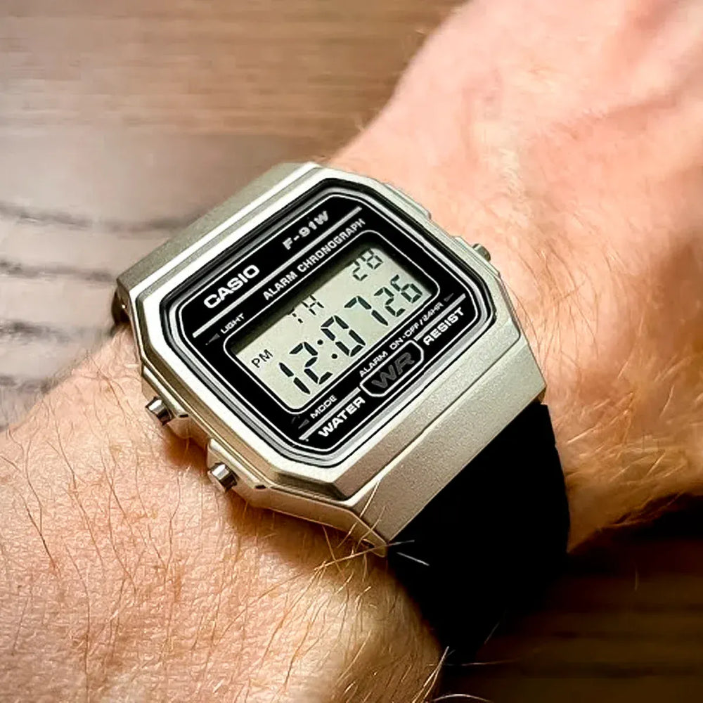 Reloj Casio F-91WM-7ACF original con cronómetro, alarma y correa de resina.