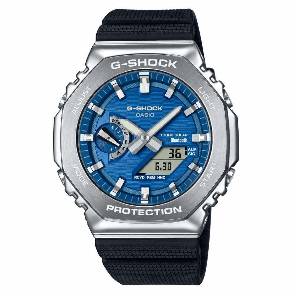 Reloj Casio G-SHOCK GBM-2100A-2B con esfera azul, bisel octagonal plateado y correa negra de resina, vista frontal.