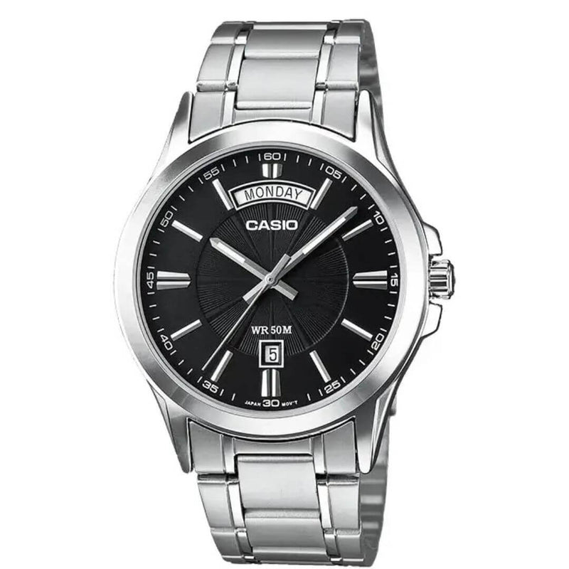 Reloj Casio MTP-1381D-1A hombre con brazalete de acero plateado y esfera negra.